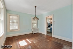 Formal Dining room has plenty of light.