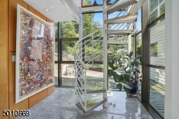 Contemporary Gem in Millburn with a 28 ft glass and steel addition and the South Mountain Reservation in your backyard!