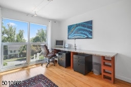 Contemporary Gem in Millburn with a 28 ft glass and steel addition and the South Mountain Reservation in your backyard!