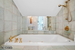 Contemporary Gem in Millburn with a 28 ft glass and steel addition and the South Mountain Reservation in your backyard!