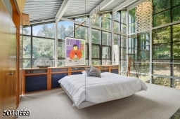 Contemporary Gem in Millburn with a 28 ft glass and steel addition and the South Mountain Reservation in your backyard!