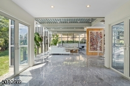 Contemporary Gem in Millburn with a 28 ft glass and steel addition and the South Mountain Reservation in your backyard!