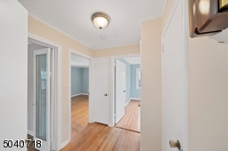 The first floor has 2 bedrooms and a full bathroom
