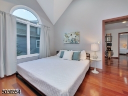 High ceiling guest bedroom