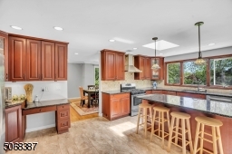 Stainless Appliances, Center Island, Large Windows & Skylight