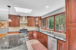 Stainless Appliances, Center Island, Large Windows & Skylight