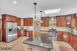 Stainless Appliances, Center Island, Large Windows & Skylight
