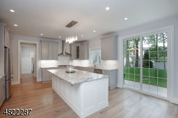 Wood Cabinets, SS Appliances, Quartz Counters