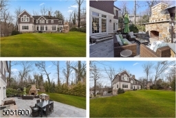 Bluestone Patio with built-in fireplace and outdoor Kitchen. Level and secluded grassy backyard beyond the patio.