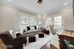 The Leisure  Room or second Home Office features 3 walls with windows and additional access to the rear grounds.