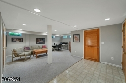 Basement w/rec room, office, powder room, laundry and utility room