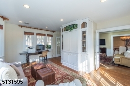 Two sets of French doors open to a family room and onto the fenced backyard and patio, creating an outstanding indoor-outdoor flow.