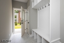 Located upon entrance from garage or back door.