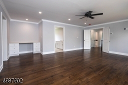 This Master Suite has a ceiling fan, recessed lights, vanity, impressive en-suite bathroom and an amazing walk-in closet.