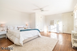 One of 3 bedrooms on the 2 floor. Three big windows fill this room with light. There are 2 closets and hardwood floors.