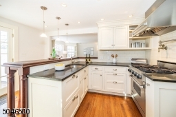 Gourmet kitchen with custom cabinets, granite counters and Viking appliances