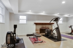 POLISHED CONCRETE FLOORS AND WOOD BURING FIRE PLACE.