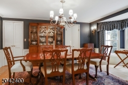 BANQUET  SIZE DINING ROOM OPENS TO KITCHEN