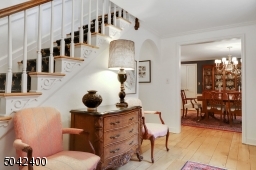 NOTICE RADOM WIDTH WOOD FLOORS. FLOWS TO DINING AND LIVING ROOMS.