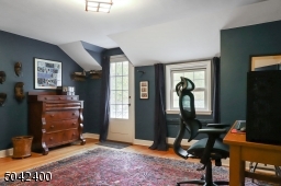 THIS BEDROOM LEADS OUT TO THE OPEN PORCH