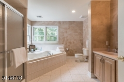 Primary bedroom bath with jacuzzi tub