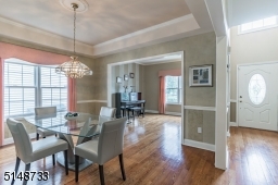 Open floor plan between Dining Room and Living Room