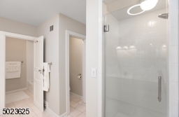 Stall Shower, Tub and Walk-in Closet