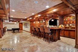 Walk out to an amazing outdoor kitchen from this room