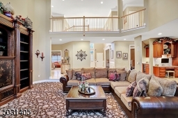 Balcony from second level overlooking the family room - Notice the open space