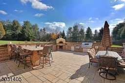 Notice the Pizza oven and this amazing entertaining space