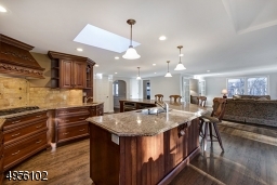 Dynamic open floor plan for today's lifestyle. Super size for entertaining and holiday parties. Slider to hand set stone patio and rear grounds. Gleaming oak floors throughout