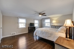 Luxury size room with en'suite full bath and multiple closets.
