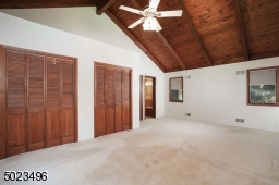 Located at the end of the hallway with an abundance of natural light.