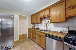 Stainless Steel appliances and a walkout entrance to the patio and backyard.