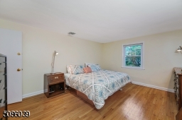 Spacious 1st FL primary bedroom.