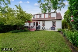 Enjoy this beautifully landscaped yard for relaxing or entertaining.