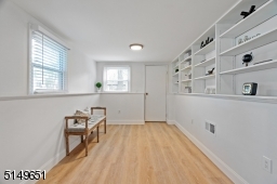 Convenient mudroom off garage has tons of storage