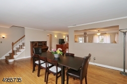 Beautiful wood burning fireplace located in Dining Room