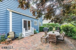 Sliders off of the kitchen to a beautiful patio with privacy.