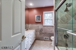 Updated Main Bath on 2nd floor.  Notice the special detail with  shower and tub