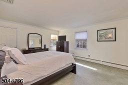 Large walk in closet and stall shower en suite Bath