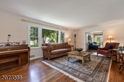 Overlooking large backyard on almost 1/2 acre lot