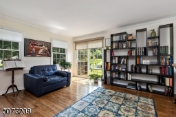 Main level office with sliders to side yard