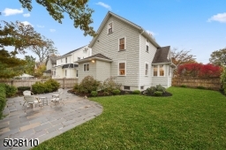 Flat, lushly landscaped private fenced-in  backyard Spacious Bluestone patio