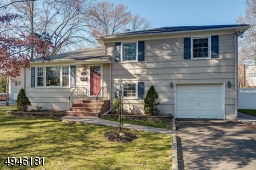 This lovely, updated split-level is nestled on a serene stretch of property in the beautiful Township of Cranford.