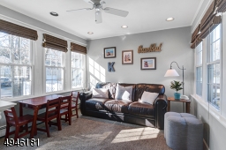 The den offers access to backyard, deck & patio.