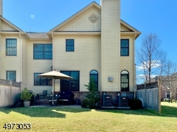 enjoy the outdoors. paver patio access from kitchen dining area