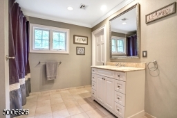 This full bathroom has its own bedroom.  Enjoy the radiant heated flooring.