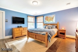Hardwood flooring throughout this home. Every room in this house is generous in size!