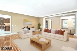 This room is so open and airy. Connected to the kitchen, deck and open porch, it is really the anchor of all and any sized gathering.